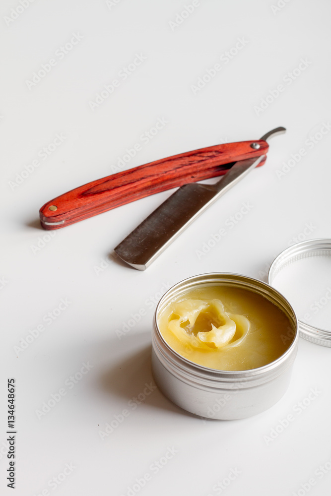 white desktop with tools for shaving beards