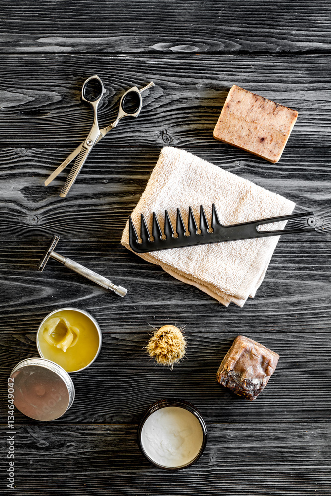 Tools for cutting beard barbershop top view on wooden background