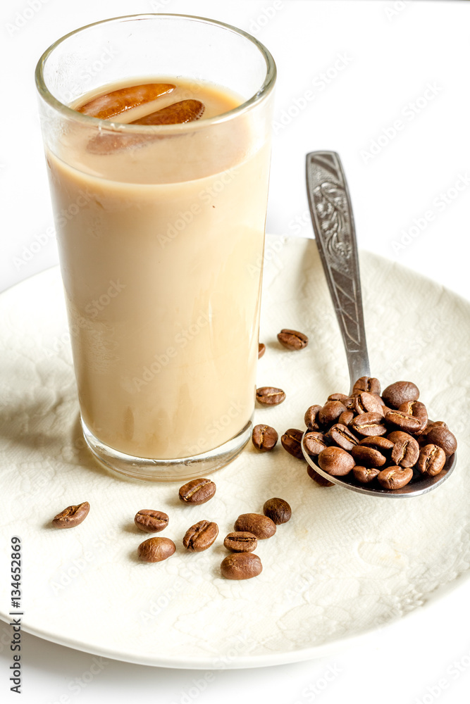 coffee with ice in glass on white background