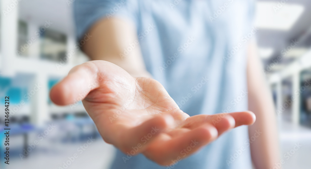 Businessman showing his empty hand