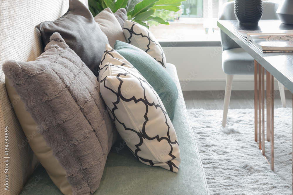 set of pillows on luxuty sofa in living room