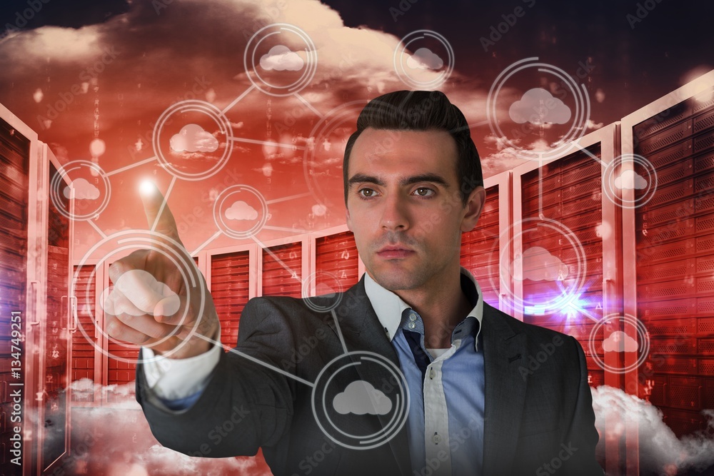 Composite image of handsome young businessman pointing