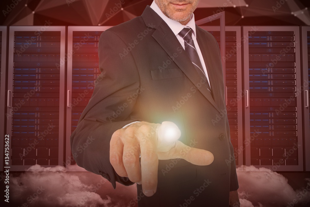 Composite image of businessman pointing