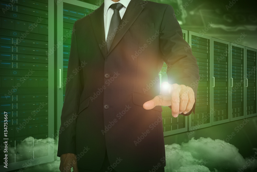 Composite image of businessman pointing