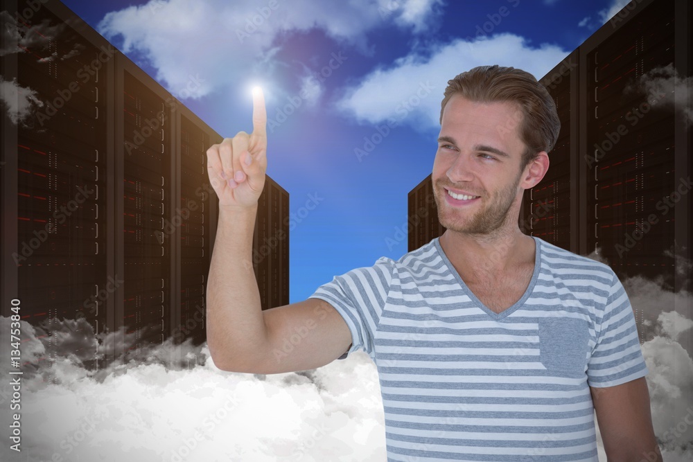 Composite image of handsome man pointing at something