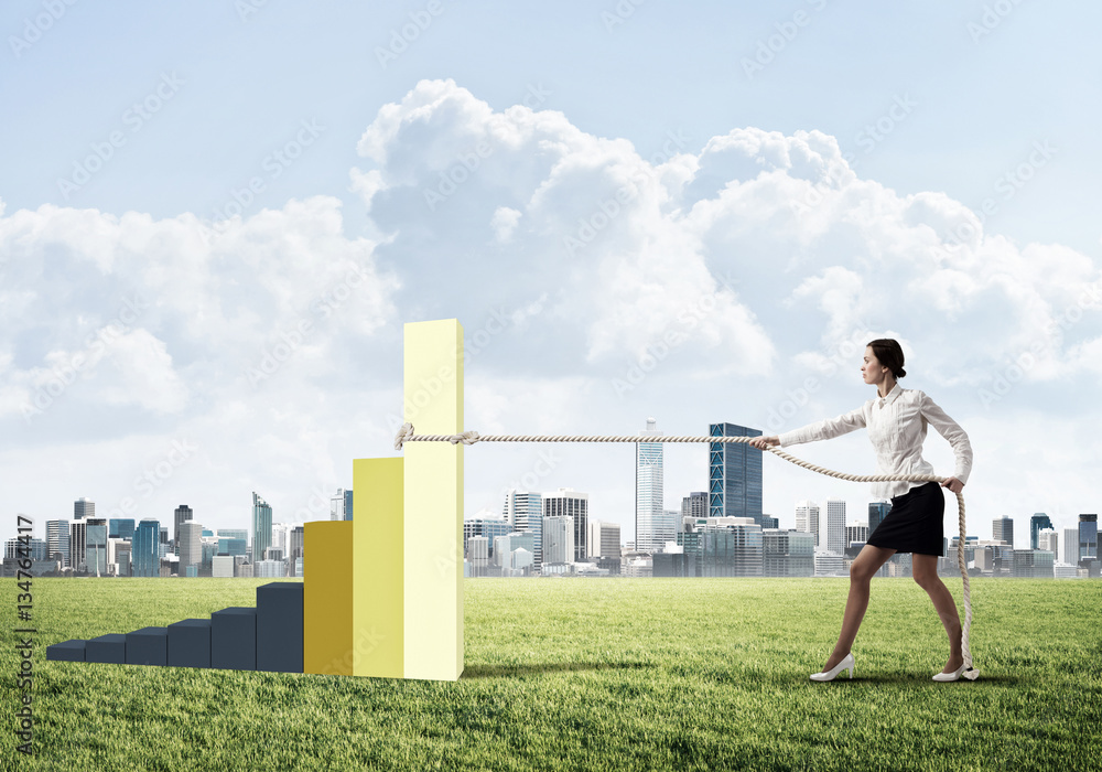 Businesswoman pulling arrow with rope and making it raise up