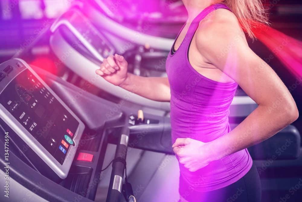 Woman walking on treadmill