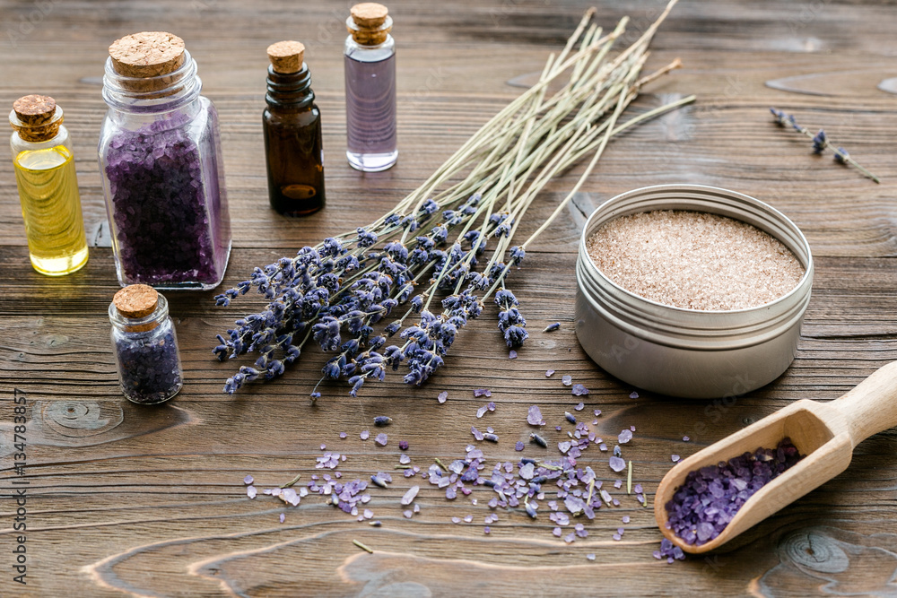 organic cosmetics with lavender on wooden background