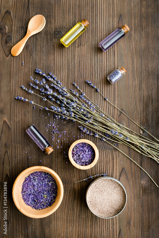 organic cosmetics with lavender on wooden background top view