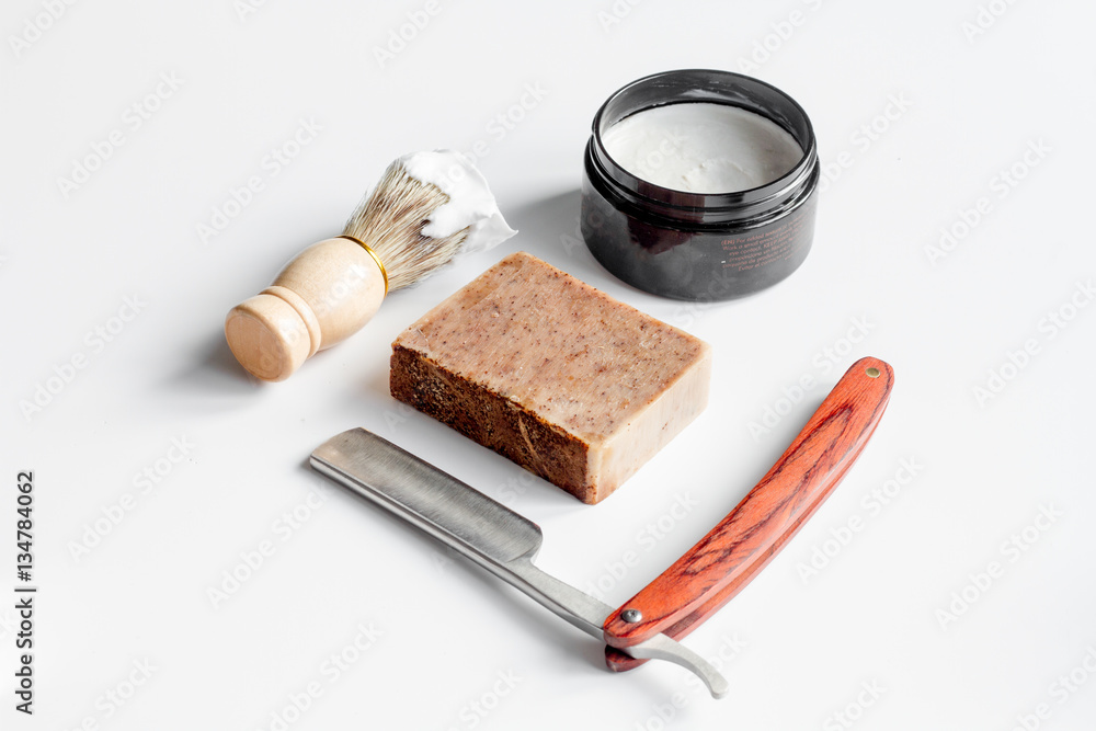 white desktop with tools for shaving beards