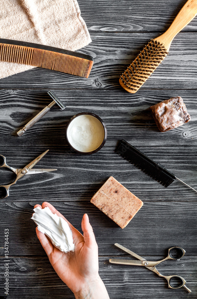 Tools for cutting beard barbershop top view on wooden background