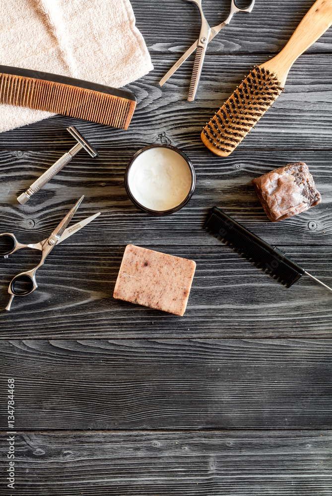 Tools for cutting beard barbershop top view on wooden background