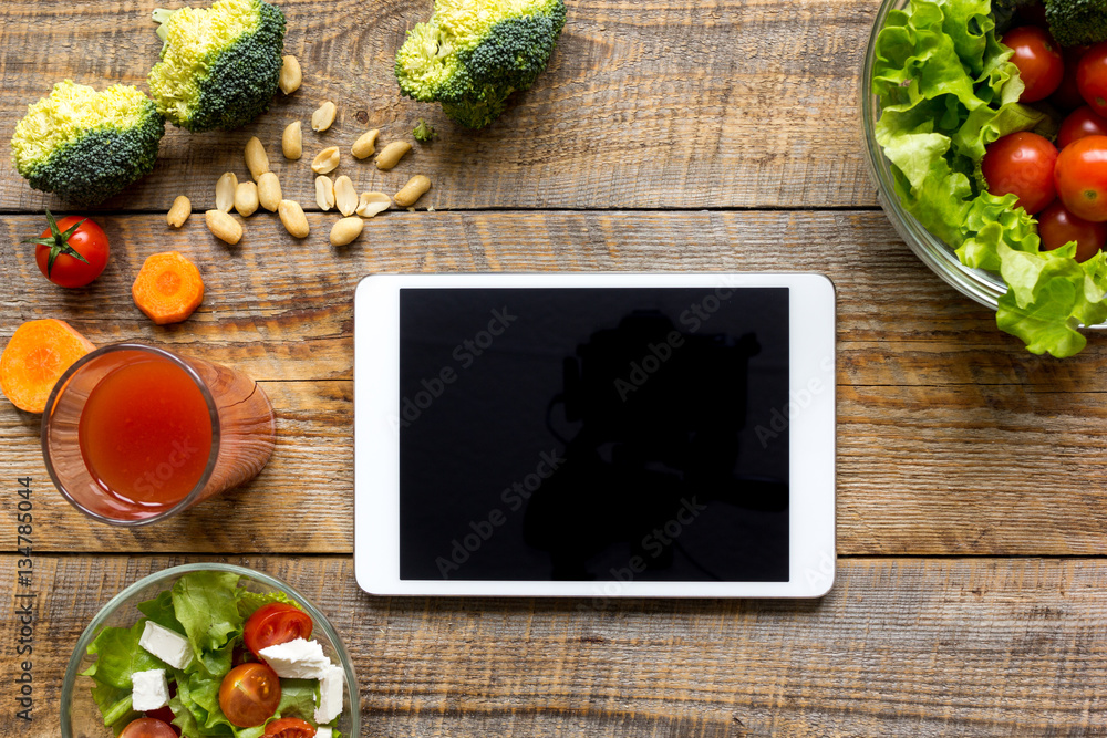 concept diet and tablet with vegetables mock up