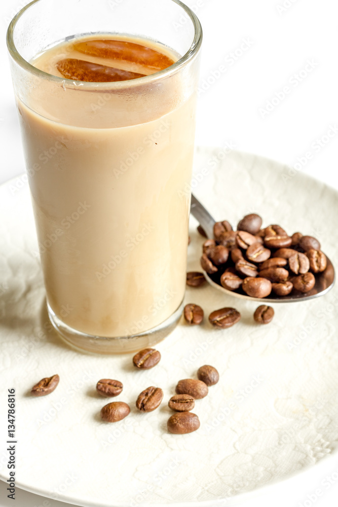 coffee with ice in glass on white background