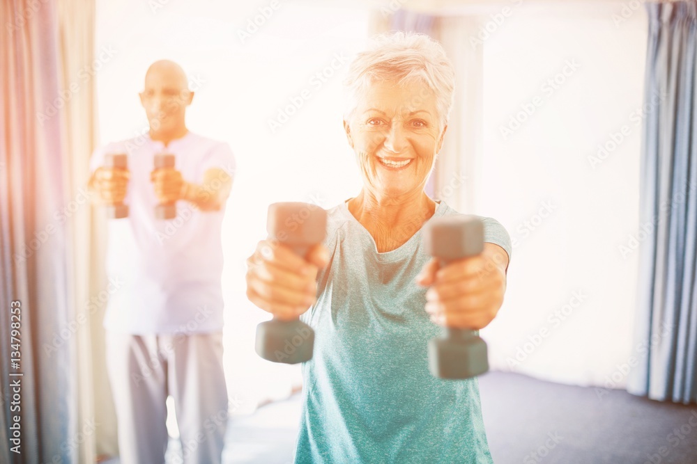 Seniors using weights