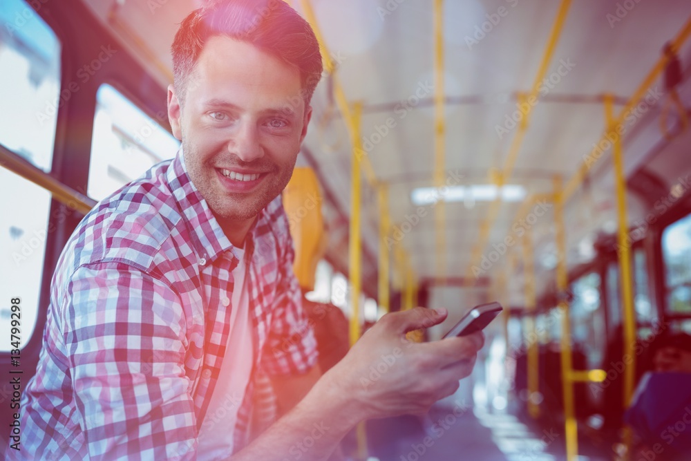 Portrait of handsome man using mobile phone