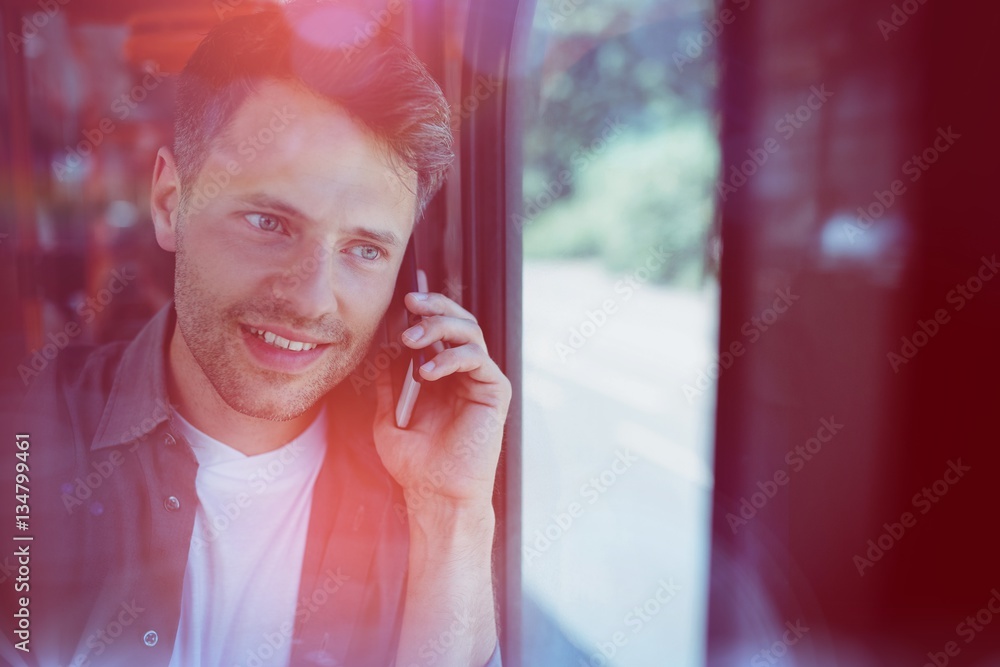 Close up of handsome man talking on mobile phone