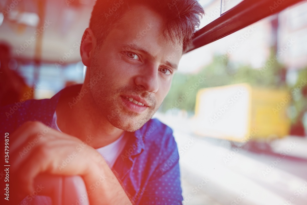 Portrait of man traveling in bus