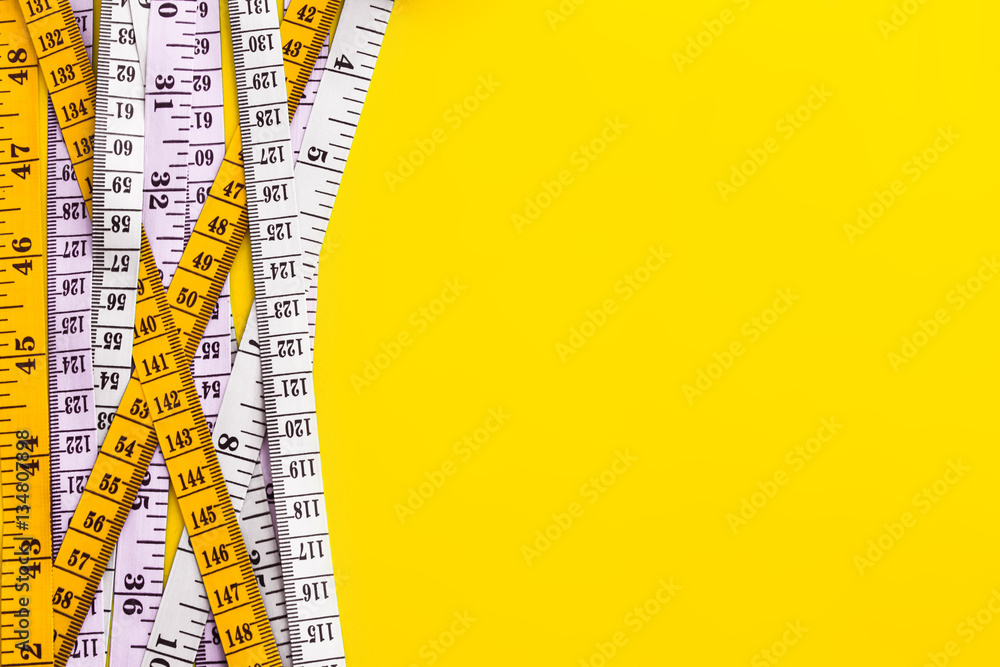 Diet control concept background. Colorful of Measuring tape 