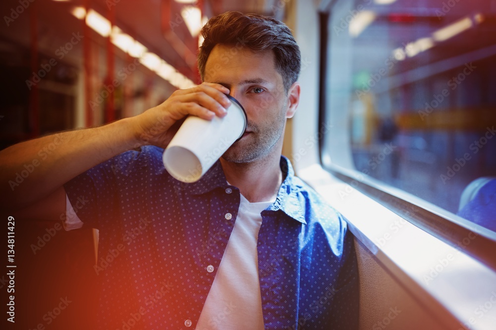 Handsome man drinking coffee