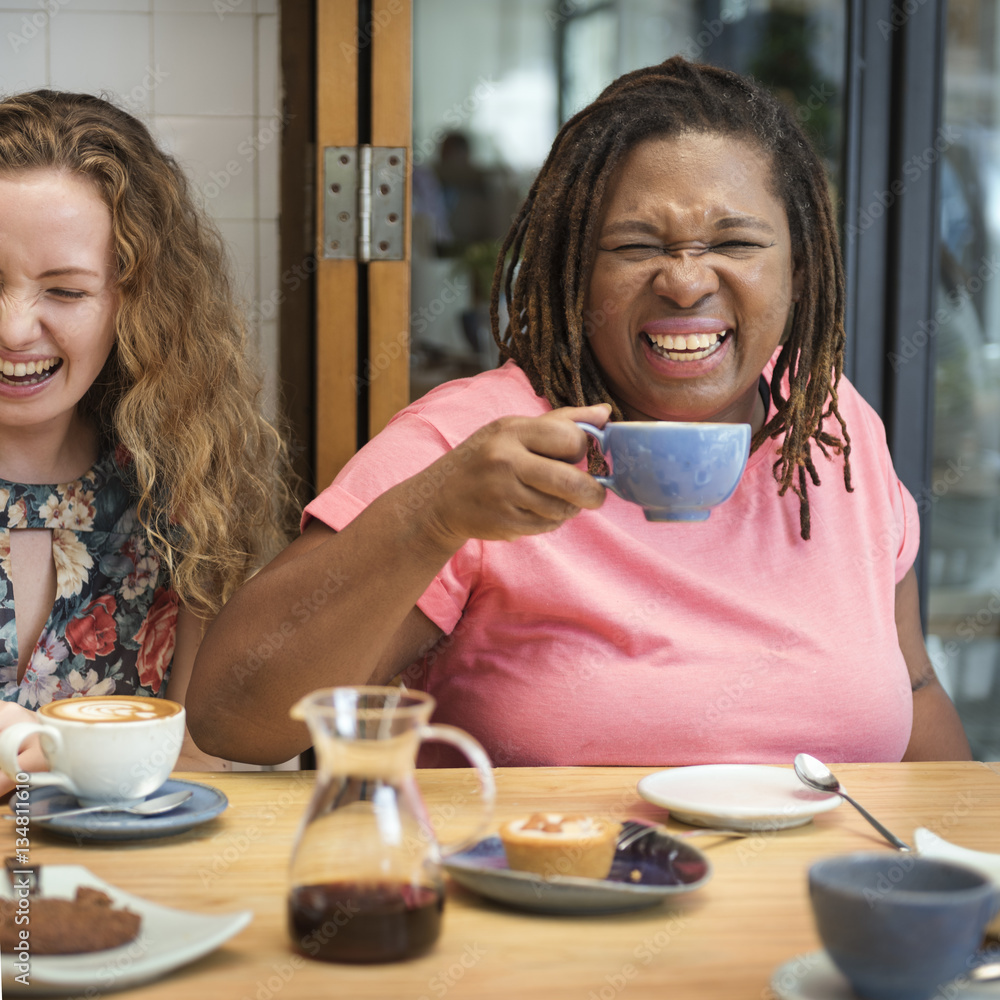 Young Women Drinking Coffee Concept