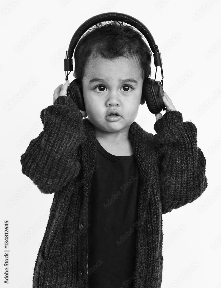 Little Boy Headphone Listening Music Concept