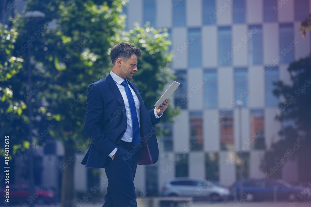 Businessman using digital tablet