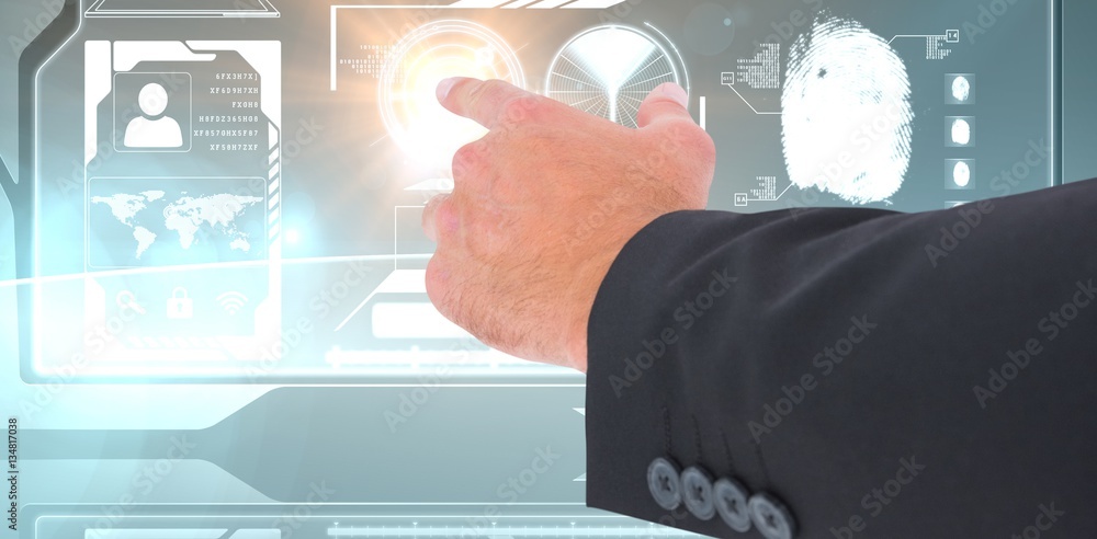 Composite image of businessman pointing with his finger