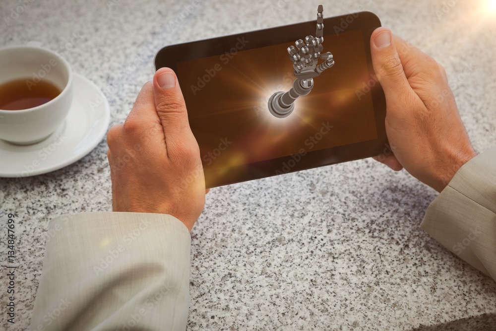 Composite image of businessman holding small tablet at table 3d