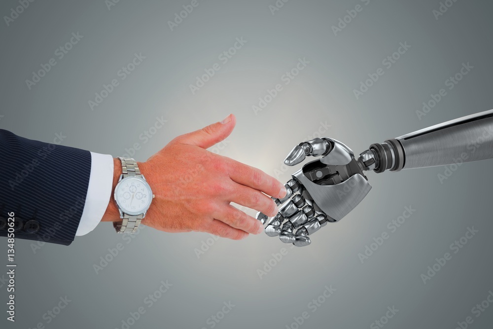 Composite image of businessman in suit clenching fists