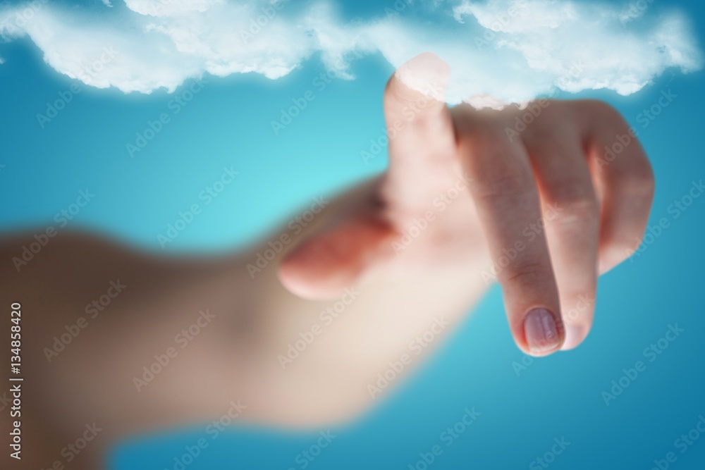 Composite image of cropped image of woman hand pointing