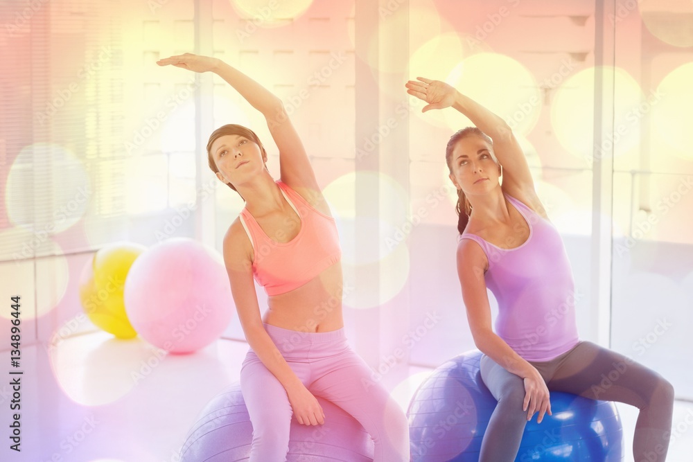 Women exercising in health club