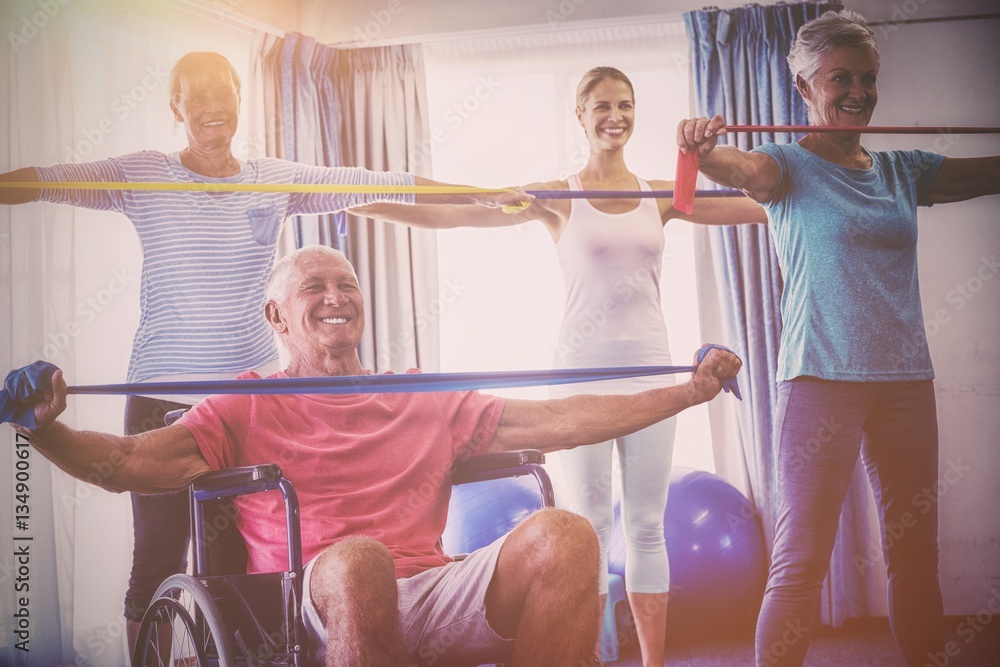 Seniors stretching during fitness class 