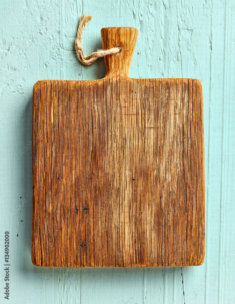 Cutting board on wooden table