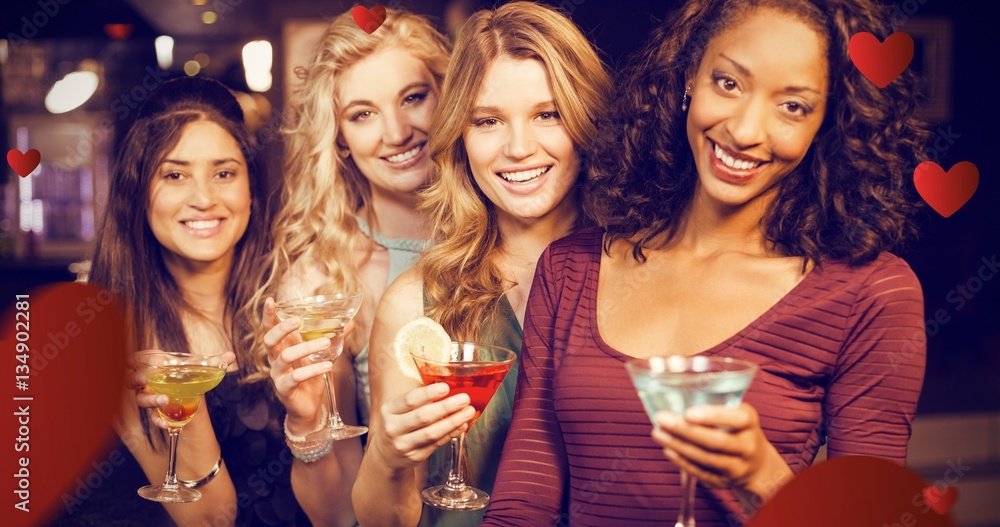 Composite image of portrait of friends having a drink