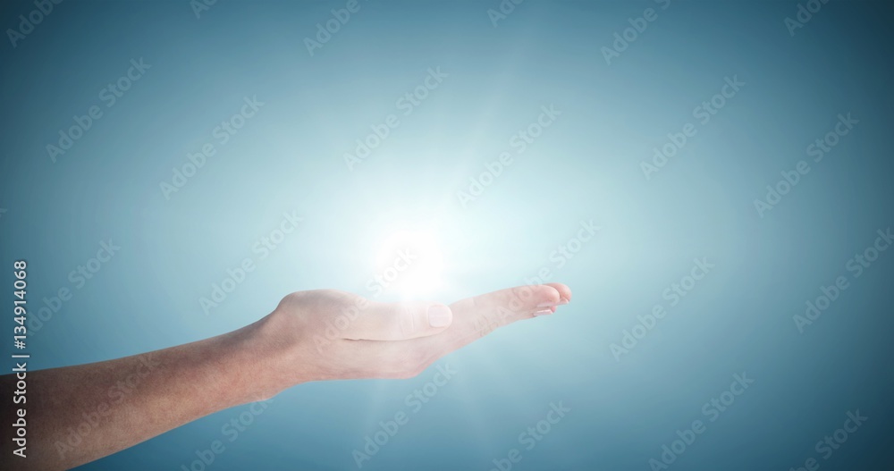 Composite image of cropped image of woman hand