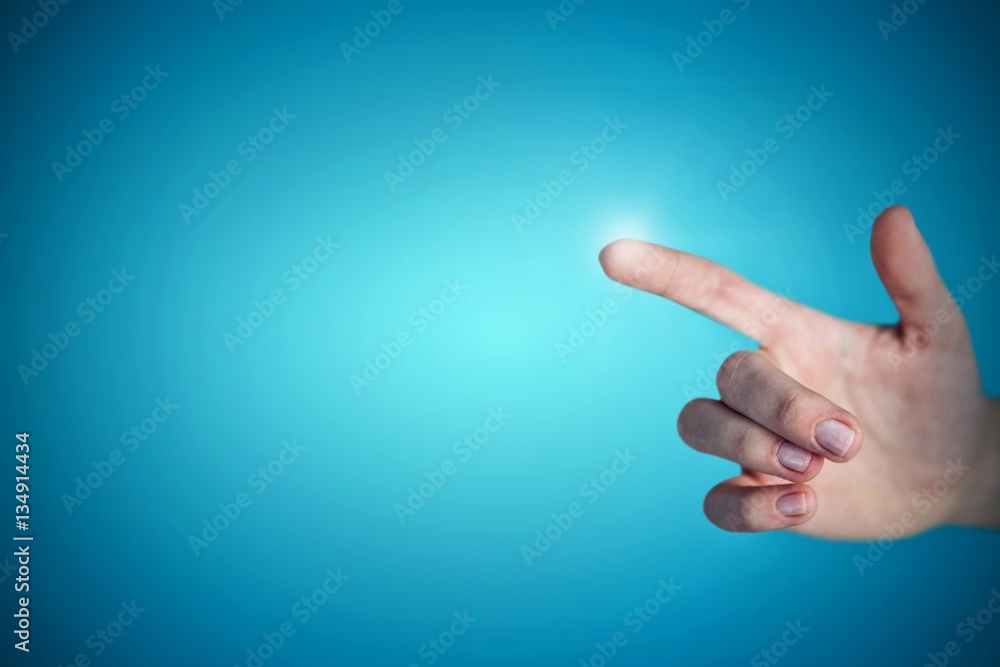 Composite image of cropped hand of woman pointing