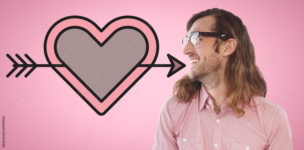 Composite image of happy hipster holding book and pen