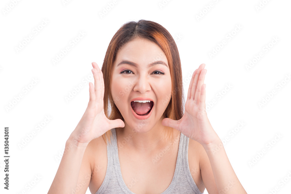 Winning success asian woman screaming isolated on white backgrou