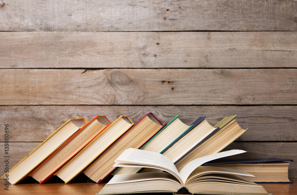 books on the wooden background