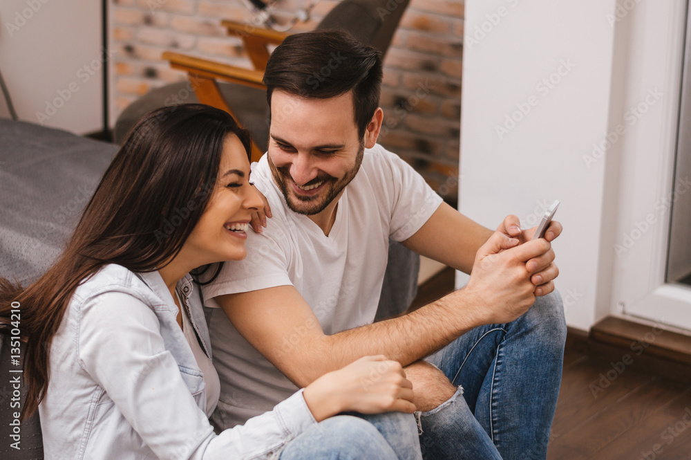 Cheerful beautiful young couple spending time together