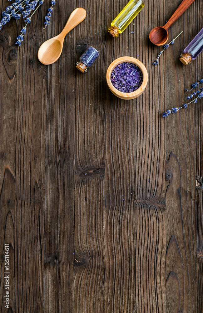 organic cosmetics with lavender on wooden background top view