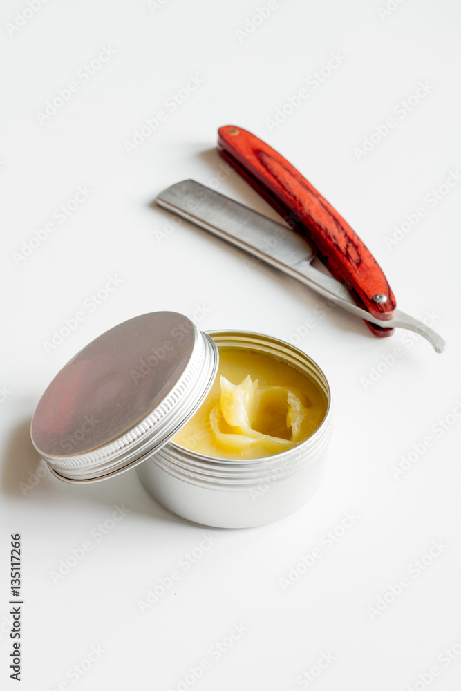 white desktop with tools for shaving beards