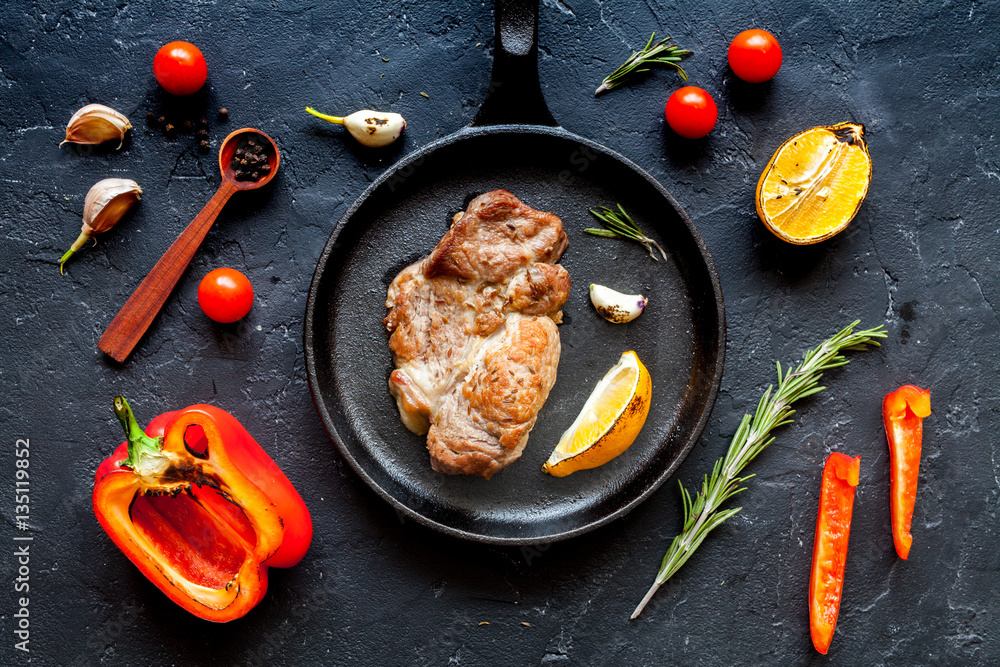 concept cooked steak on dark background top view