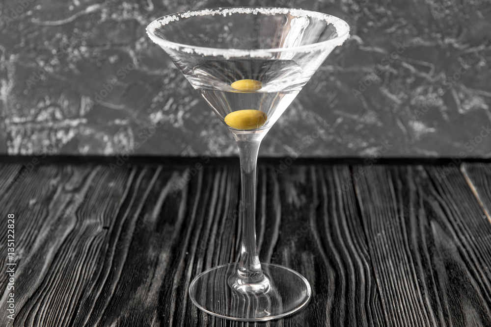 martini cocktail at wooden background close up