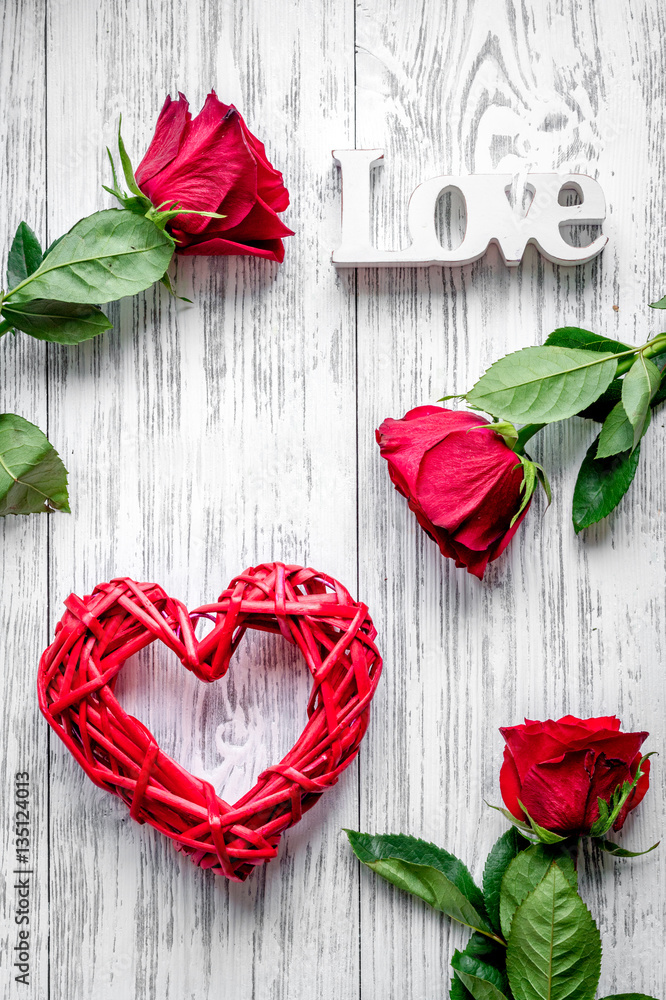 concept Valentines Day with flower wooden background top view