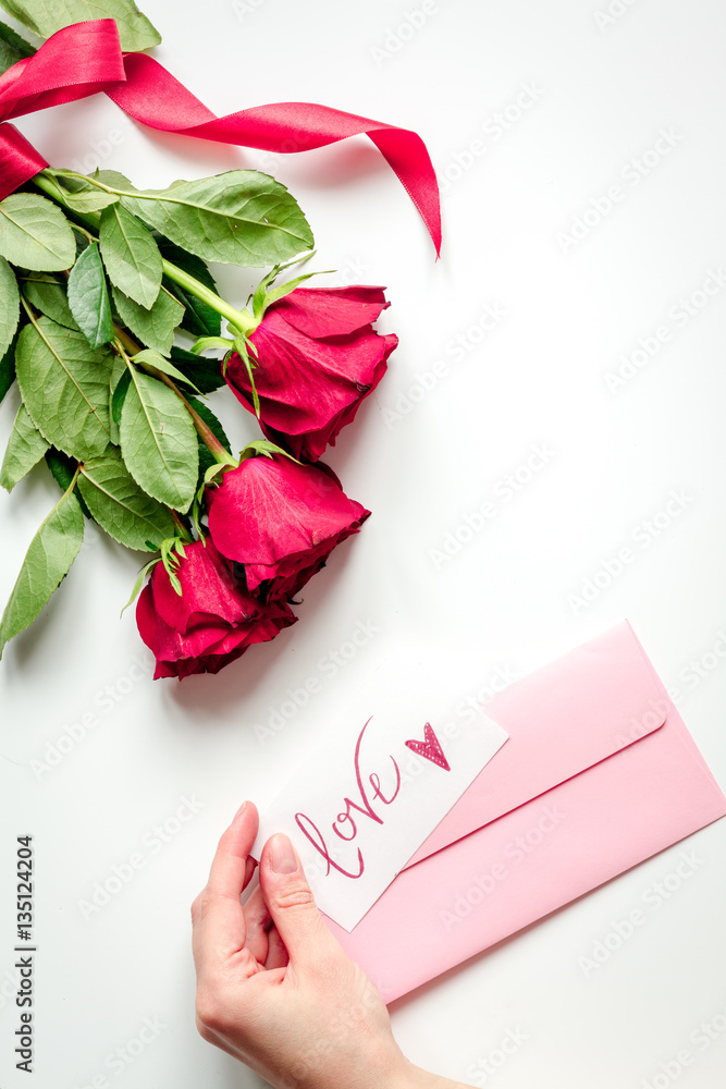 concept Valentines Day with flower white background top view