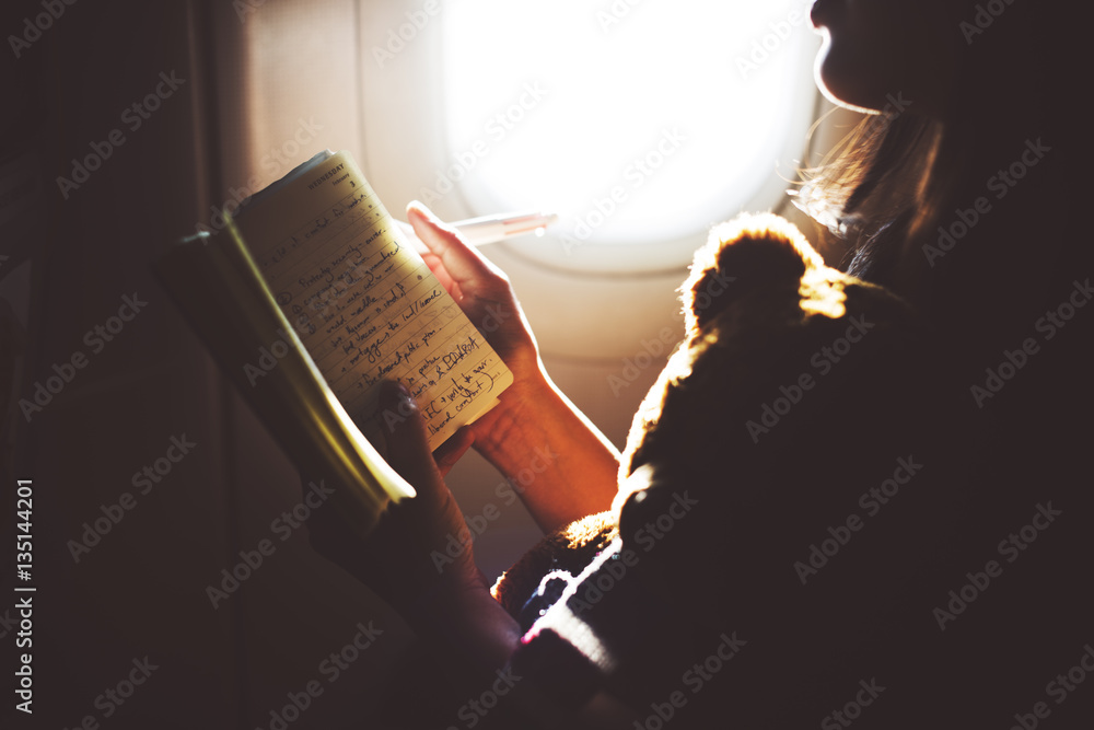 Woman Reading Book Plane Flying Concept