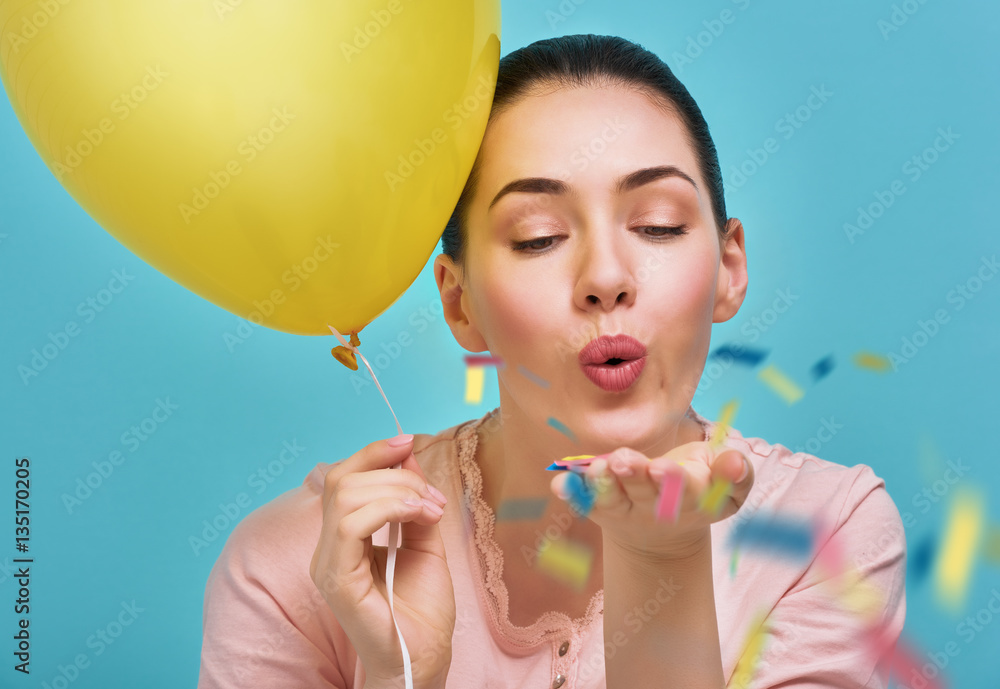 woman on background of bright blue wall