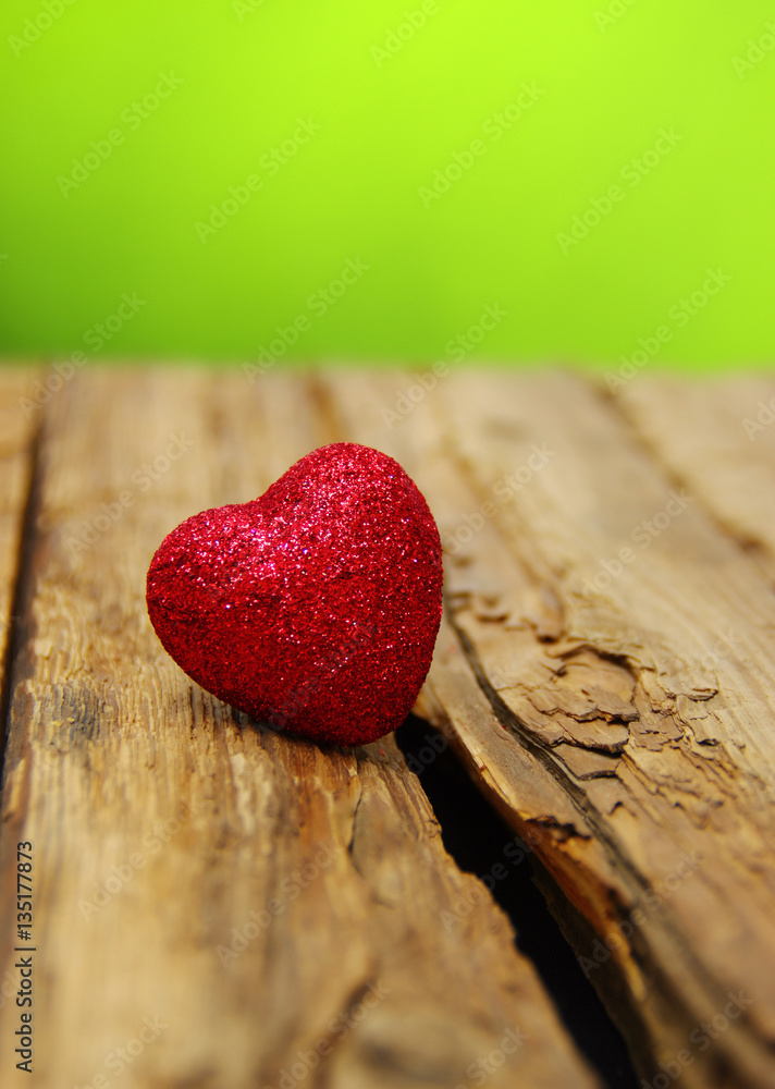 Red heart on a wood